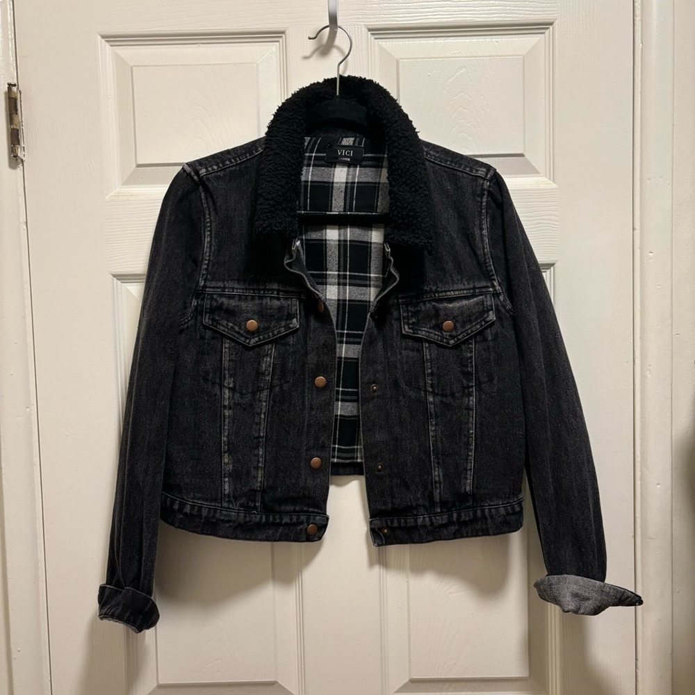 Black denim jacket with flannel inside and fur collar